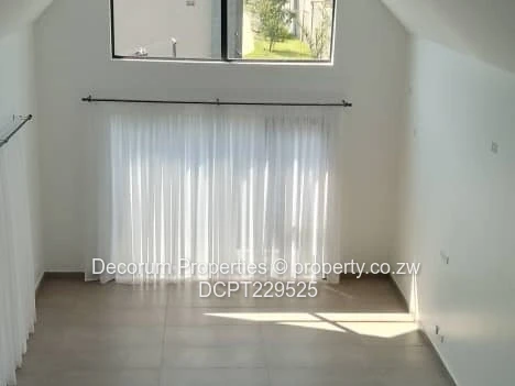 Spacious 4-Bedroom Double- storey Home with Borehole in Borrowdale for Rent!