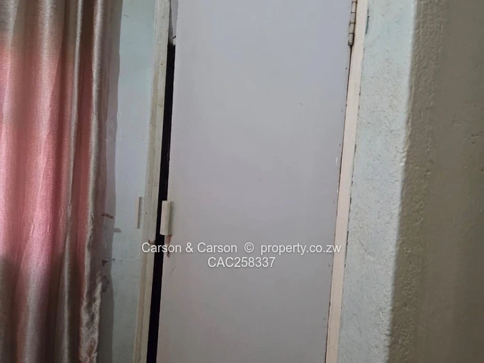 Mufakose 2 bedroom flat lounge fitted kitchen combined toilet and bathroom on ground floor 