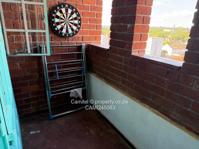 Chinamano Heights:Parquet-Floored 2-Bed Avenues Flat with Borehole (Sole Mandate)