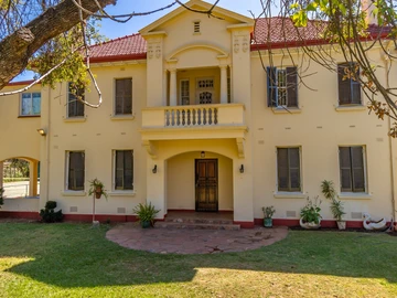 Distinguished Corner Property In Upper Avenues