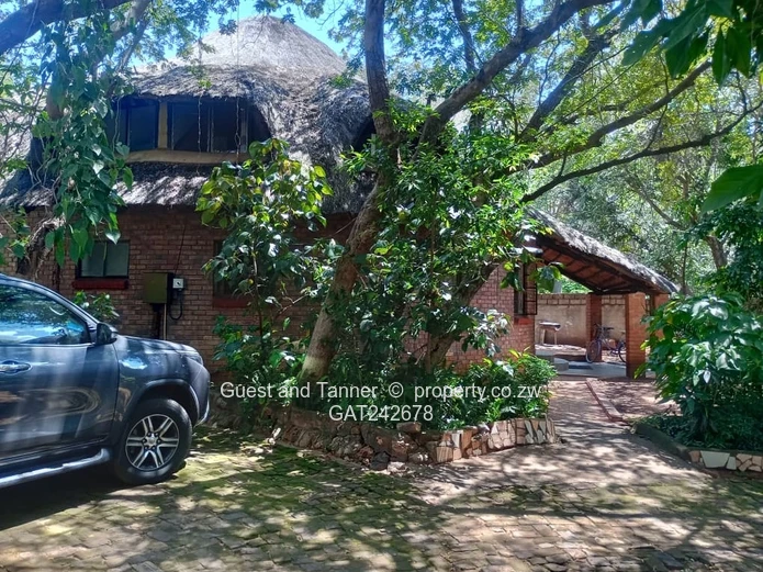 Ten bedroomed lodge under thatch for sale 