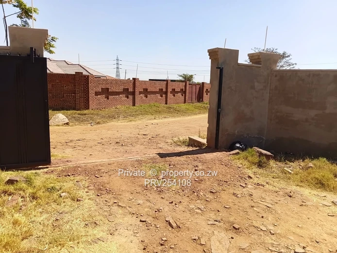 5-Bed Home with Brick Wall & Metal Gate in Pomona