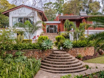 Family home in Glen Lorne with views and trees!