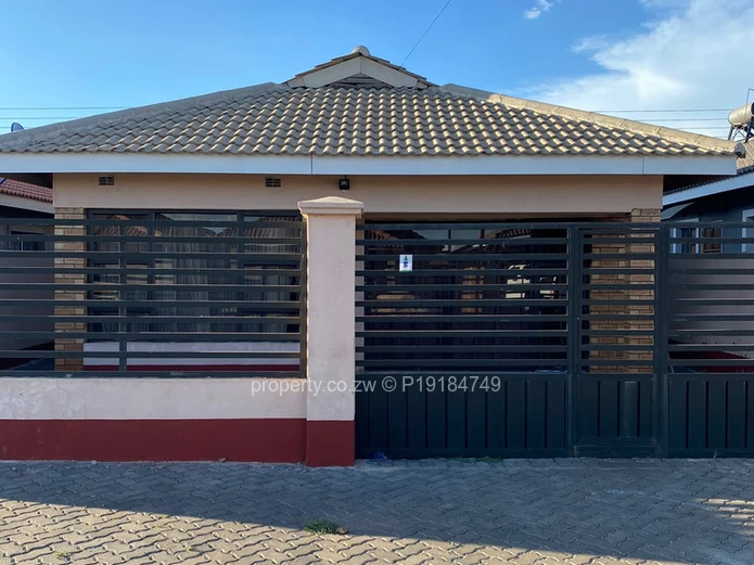 3-Bed Walled Home, Tiled Roof & Secure Gate — Aspindale