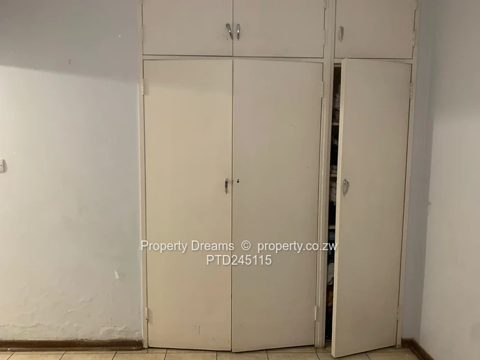 Harare CBD 2-Bed Garden Flat — Updated Kitchen & Borehole