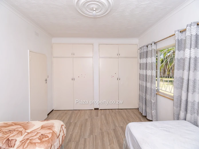 Strategically Located 4-Bedroom Family Home with Cottage – Sunridge, Harare Drive Frontage