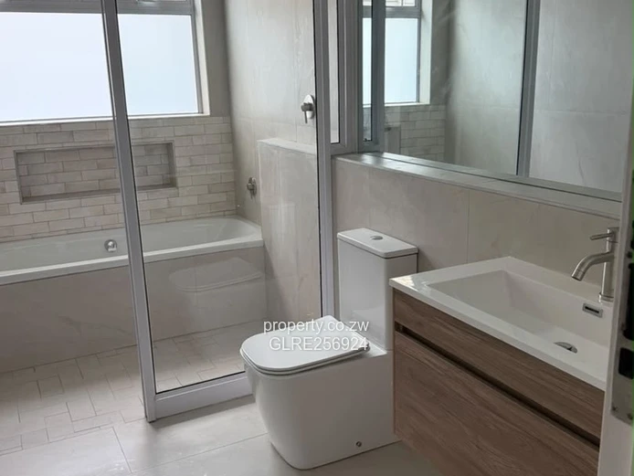 Modern 3-Bed Flat in Borrowdale with Verandah & Solar
