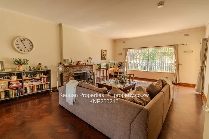 Attractive five bedroom home on two and a half acres. Good water and Msasa trees. (Sole Mandate)