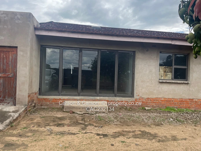 Walled 3-Bed Home with Verandah & Main Road Frontage