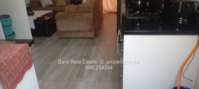 Tynwald 2-Bed Garden Flat — Borehole & Paved Yard