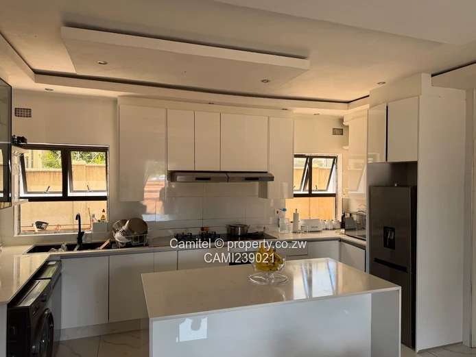 2100sqm Arlington stand with modern 2 bed cottage,gated community with clean title deed (Sole Mandate)