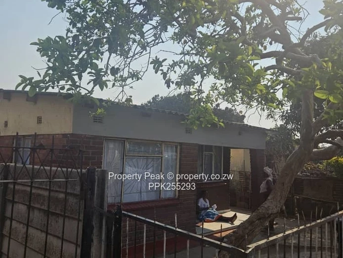11-Bedroom Brick Home in Mbare — Walled, Main Road Deeds available