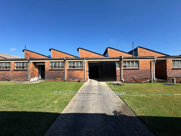 Large-Scale Commercial Property with Extensive Warehouse and Business Space In Belmont!