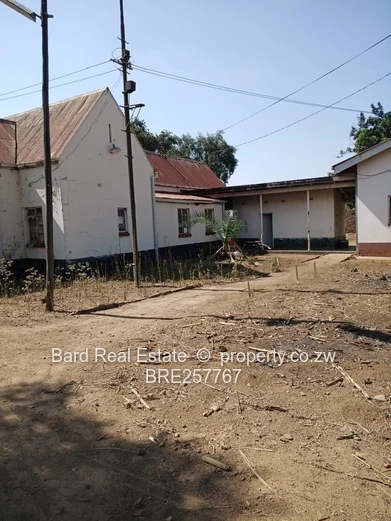 Main-Road Retail Site with Existing Building — 4,000 m²
