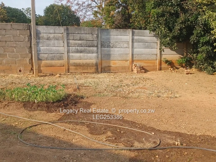 Walled 2-Bed Home on 2300m² with Verandah & Main Road Frontage (Sole Mandate)