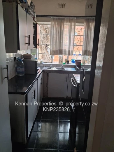 Secure 2-bedroom flat close to Avenues Hospital and Shops.