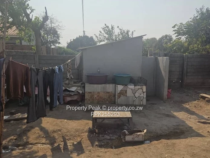 11-Bedroom Brick Home in Mbare — Walled, Main Road Deeds available