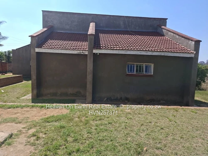 House with cottage