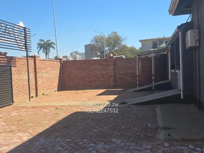 Harare CBD Office: Secure Walled Property with Paved Yard