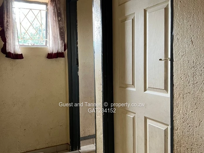 3-bedroomed house with a 2-bedroomed cottage for sale in Newton West near Bulawayo