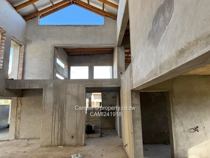 Incomplete 4 Bed double storey with a 3 bed cottage with title deed