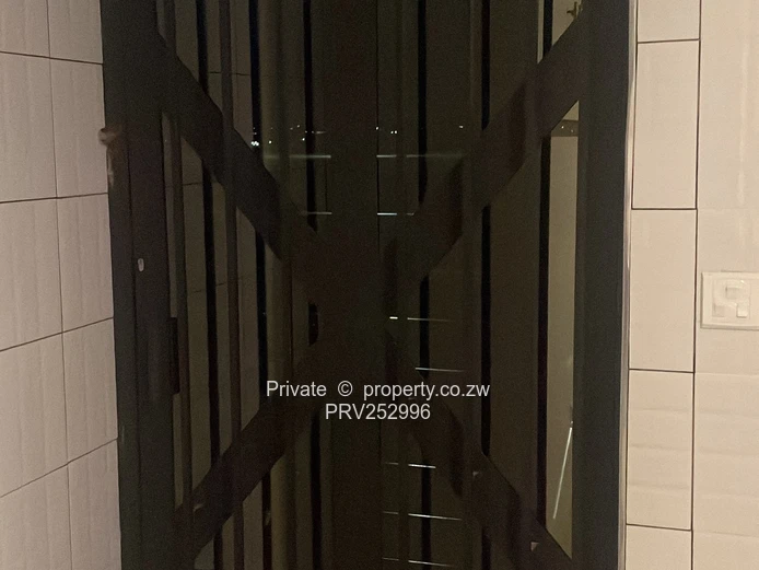 Spacious 3-Bed Zimre Park Flat with Security Grill & Borehole