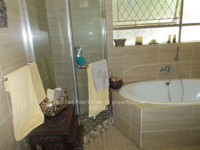 This property offers 2 homes and is set amongst stunning msasa trees