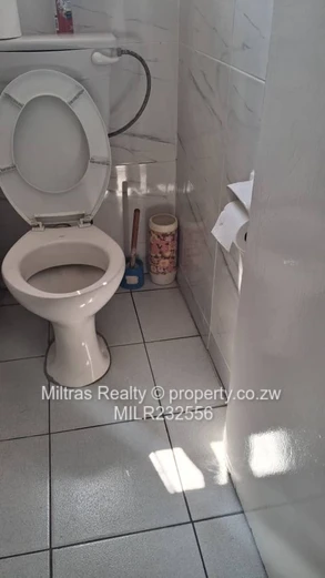 Eastlea Commercial: 1,100m² w/ Paved Yard & Borehole