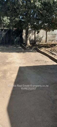 2-Bed Tiled Home with Walled Yard & Access Control