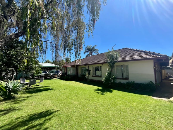 Family home with excellent water and lots of potential