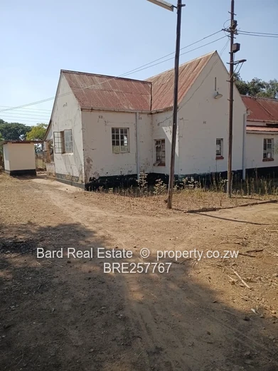 Main-Road Retail Site with Existing Building — 4,000 m²