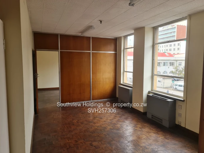 3 neat interconnecting offices plus strong room to let. 