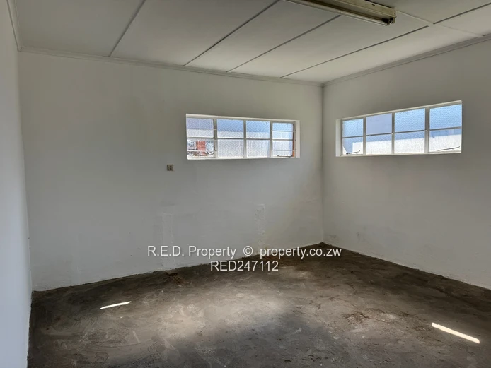 Large-Scale Commercial Property with Extensive Warehouse and Business Space In Belmont!