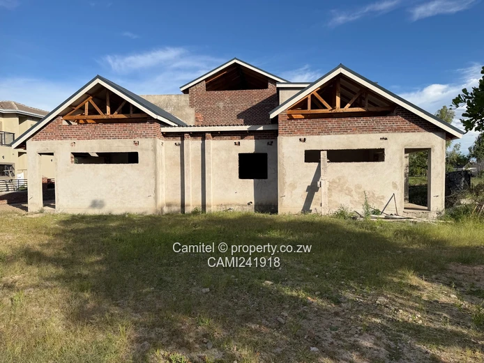 Incomplete 4 Bed double storey with a 3 bed cottage with title deed