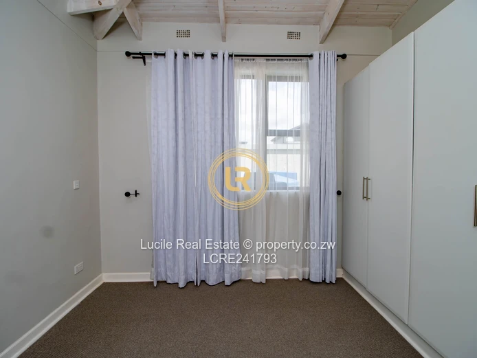 Seamless Living: A Cozy Indoor-Outdoor Retreat in Borrowdale