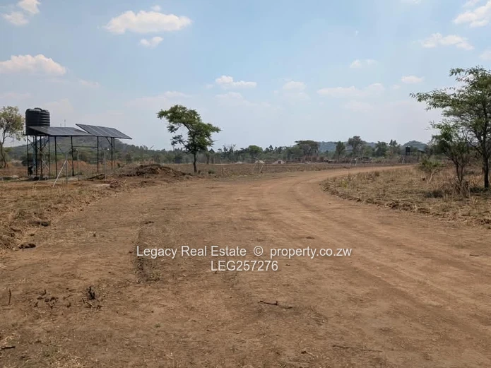 1ha Arable Farm a choice of 12 plots opposite Bulawayo rd  — Cleared Land & Road Access