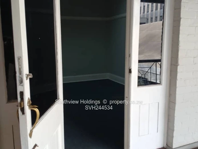 Neat office to let, Upper CBD. Gross rent USD415.00 per month.