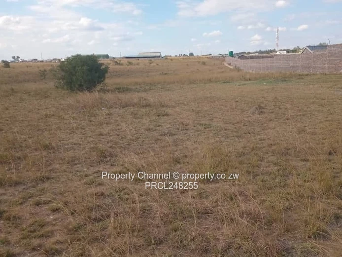5,000 sqm Level Plot in 8km west of Gweru CBD — Open Grass, Adjacent Walled Property