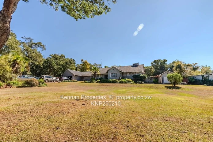 Attractive five bedroom home on two and a half acres. Good water and Msasa trees. (Sole Mandate)