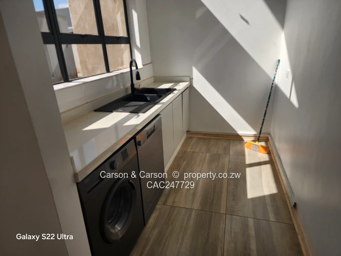 Modern 3-Bed, 2-Bath Garden Flat with Borehole – Borrowdale
