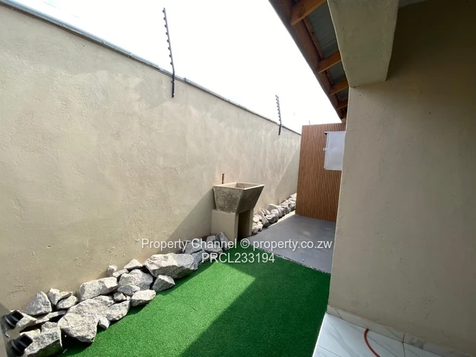 Modern 1-Bed Flat in Pomona, Harare North — Borehole