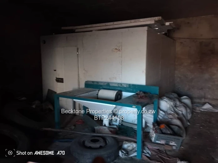 Spacious 2,420m² Walled Industrial Yard with Workshop — Bulawayo CBD