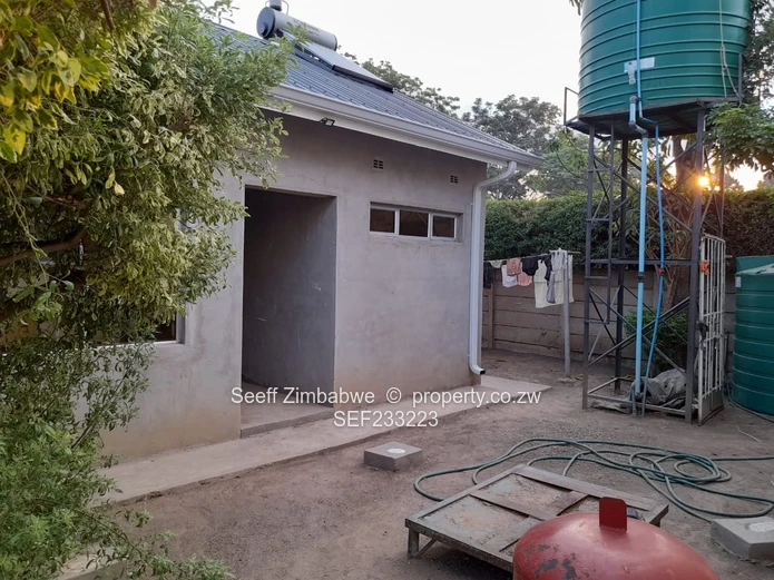 Avondale West Gem: Spacious Family Living with Cottage and Abundant Water Supply!