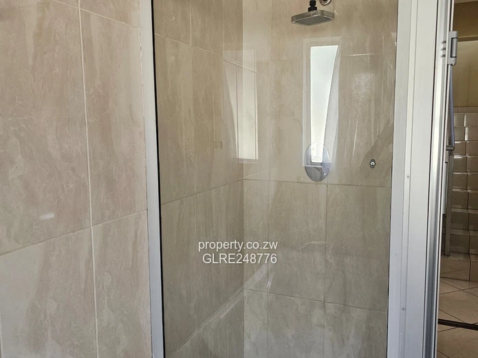 3BR Greendale Flat with Built-in Wardrobes, Borehole & Parking