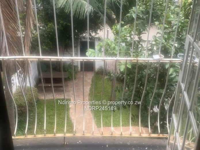 Secure 2-Bed Harare CBD Flat with Balcony, Garden & Modern Kitchen