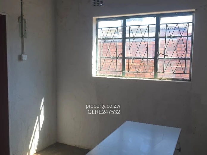Harare CBD Office: Secure Walled Property with Paved Yard