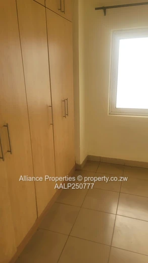 Spacious 2-Bed Ground Floor Flat with Borehole & Garden