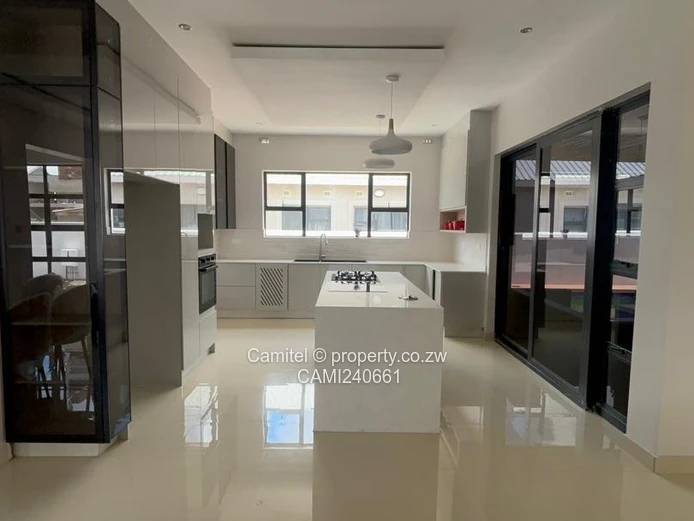 4beds all en-suite ,borehole,swimming pool sitting on 540sqm and title deed