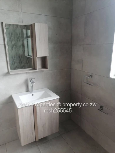 Modern 3-Bed Garden Flat in Borrowdale West with Borehole and Solar
