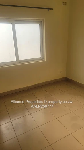 Spacious 2-Bed Ground Floor Flat with Borehole & Garden
